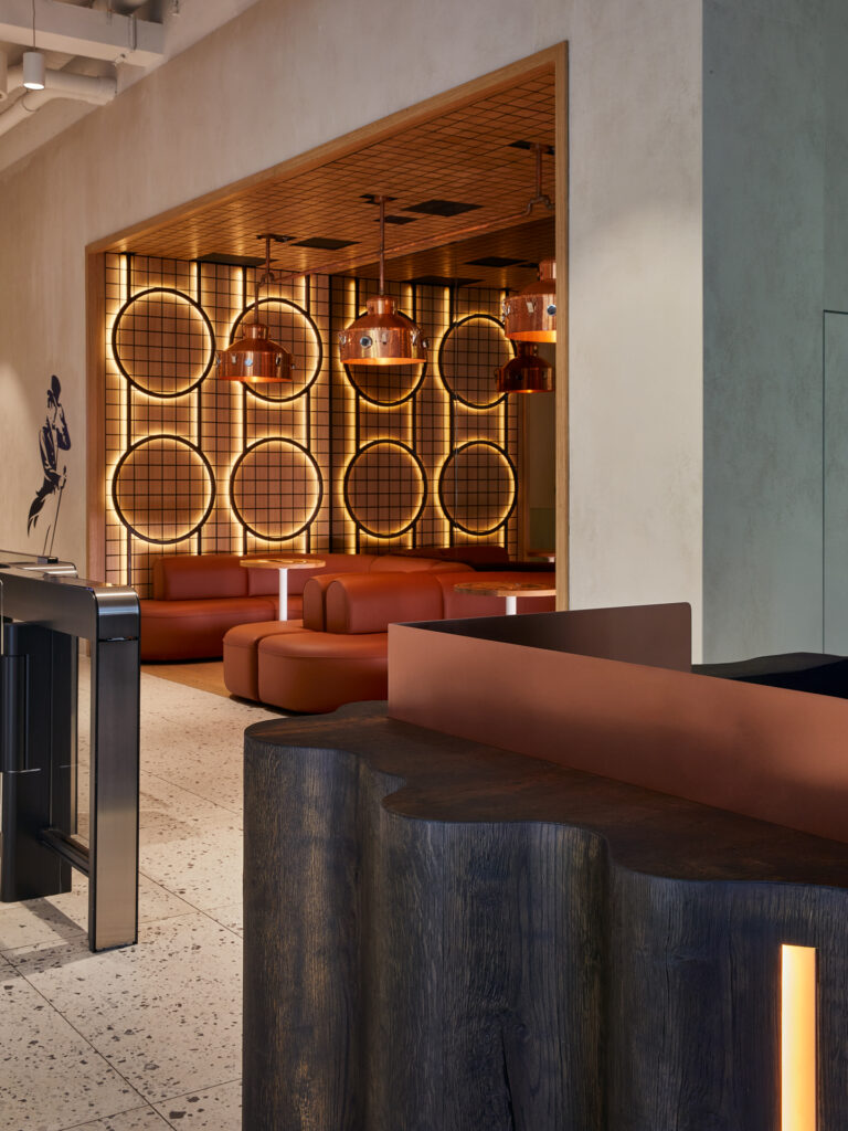 Curved reception desk with design leather sofa with design led integrated wall panel